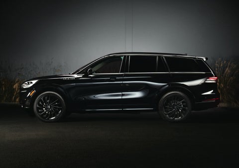 A 2024 Lincoln Aviator® SUV is shown in the Infinite Black exterior color | Thomasville Lincoln in Thomasville GA