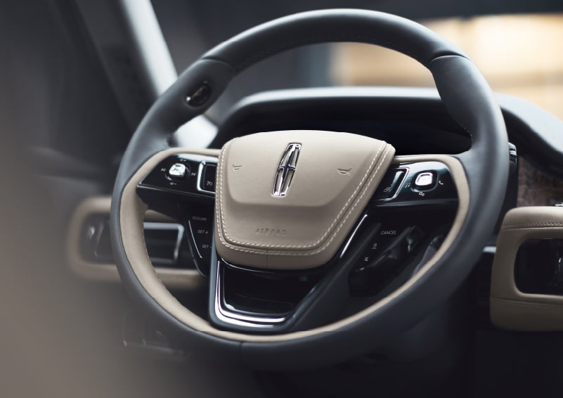 The intuitively placed controls of the steering wheel on a 2024 Lincoln Aviator® SUV | Thomasville Lincoln in Thomasville GA