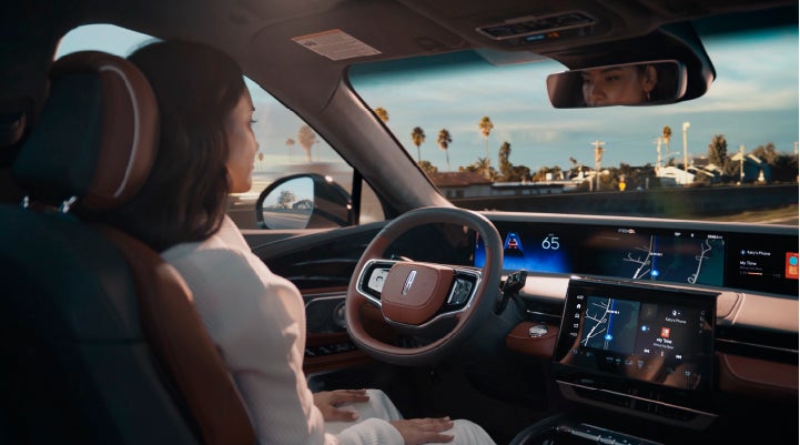 A person is shown driving hands-free on the highway with available Lincoln BlueCruise technology. | Thomasville Lincoln in Thomasville GA
