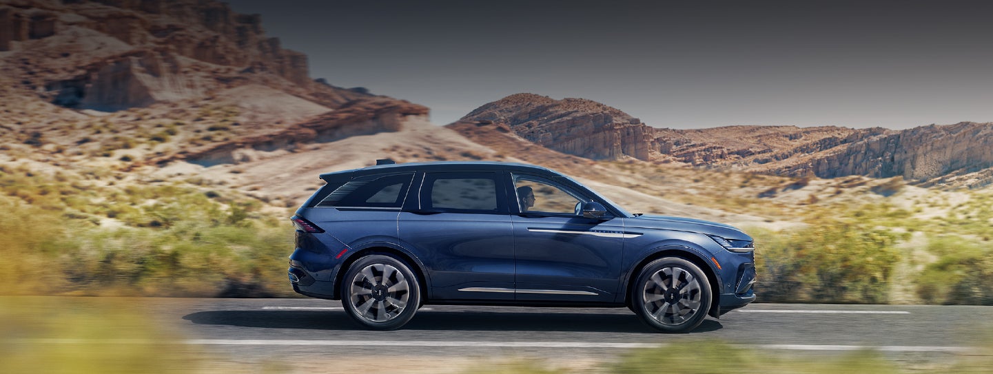 A 2024 Lincoln Nautilus® SUV is being driven in a desert setting. | Thomasville Lincoln in Thomasville GA