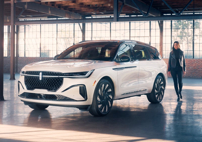 A person approaches a 2024 Lincoln Nautilus® SUV. | Thomasville Lincoln in Thomasville GA