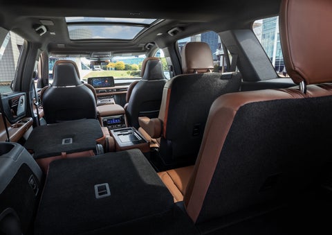 The interior of the 2025 Lincoln Aviator® SUV is shown with two seats folded down for added space. | Thomasville Lincoln in Thomasville GA
