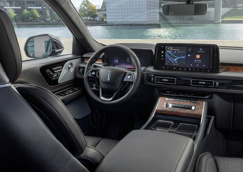 The interior of the 2025 Lincoln Aviator® SUV is shown parked with a view of a harbor through the windshield. | Thomasville Lincoln in Thomasville GA