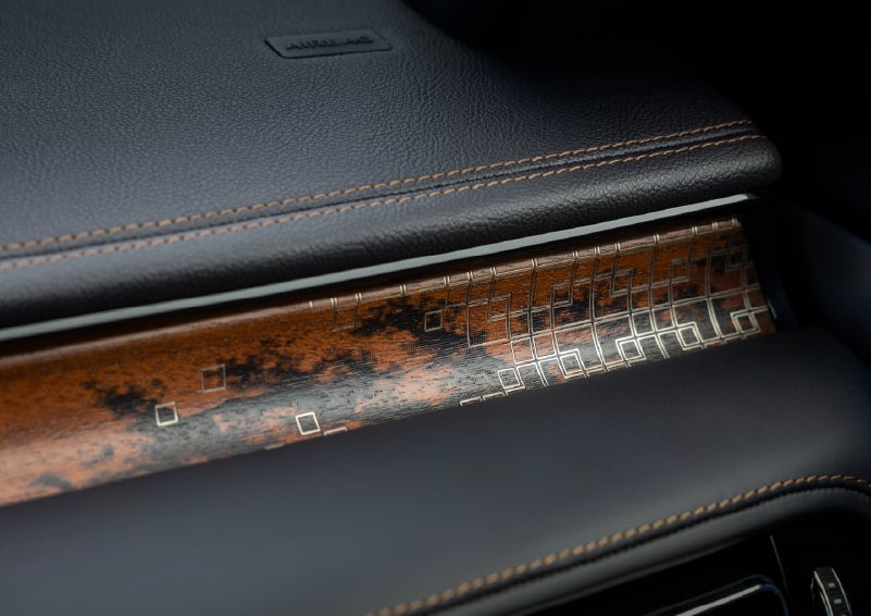 A close-up shot of the 2026 Lincoln Aviator® dashboard with unique black and brown accents and brown stitching. | Thomasville Lincoln in Thomasville GA